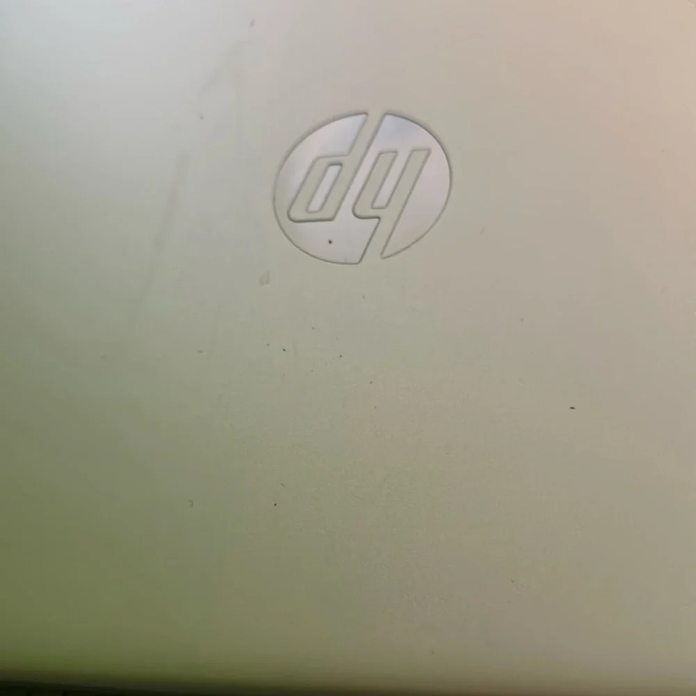 it works great color is silver it comes with a charger and a hp laptop model 15